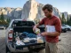 Meal Prep for Multi Day Climbing Trips That Work Climber doing meal prep for multi day climbing trips on a truck tailgate