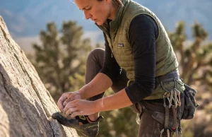 Can’t Stick Small Holds? Your Foot Placement Is Why Rock climber placing toe tip precisely on a small granite edge with focus and control