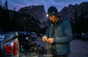 RMNP Climbing Guide What Pros Check First Professional climber preparing gear for rocky mountain national park climbing guide