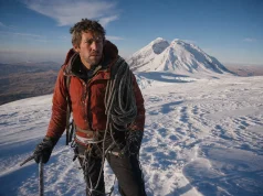 Why Huascaran Stops Climbers Below the Summit Climber on the Huascaran glacier at first light, Peru's highest peak — Huascaran climbing guide hero image