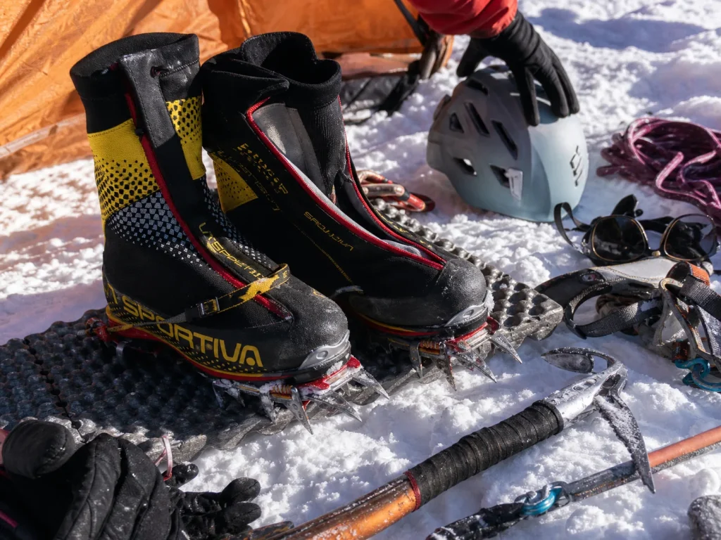 La Sportiva G2 SM double boots with crampons attached on the snow at high camp on Huascaran — Huascaran gear