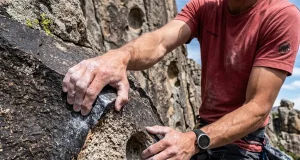 City of Rocks Idaho Climbing Guide for Every Level Climber ascending granite spire at City of Rocks Idaho at golden hour