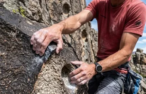 City of Rocks Idaho Climbing Guide for Every Level Climber ascending granite spire at City of Rocks Idaho at golden hour