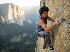 Free Soloing With No Net? Dean Potter’s Legacy Lone free soloist on a sheer Yosemite granite wall at dawn, no rope, evoking Dean Potter's legacy