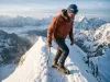 18 Famous Mountain Peaks and What They Demand Mountaineer on a knife-edge snow ridge at sunrise, one of climbing's famous mountain peaks