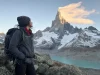 Cerro Torre Climbing History and Routes Cerro Torre granite spire capped in rime ice at dawn, a lone climber looking up from the approach