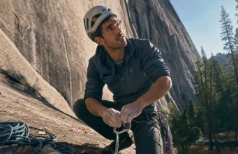 Which El Capitan Route Fits You? Here’s the Truth Climber racking up at the base of El Capitan at first light, Yosemite granite rising above