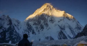 Why Every K2 Climbing Route Ends at the Same Crux K2's summit pyramid at first light above the Godwin-Austen Glacier, seen from Base Camp