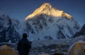 Why Every K2 Climbing Route Ends at the Same Crux K2's summit pyramid at first light above the Godwin-Austen Glacier, seen from Base Camp