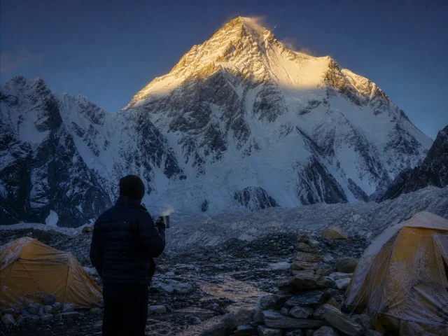 0-k2-climbing-routes-summit-pyramid-first-light K2's summit pyramid at first light above the Godwin-Austen Glacier, seen from Base Camp
