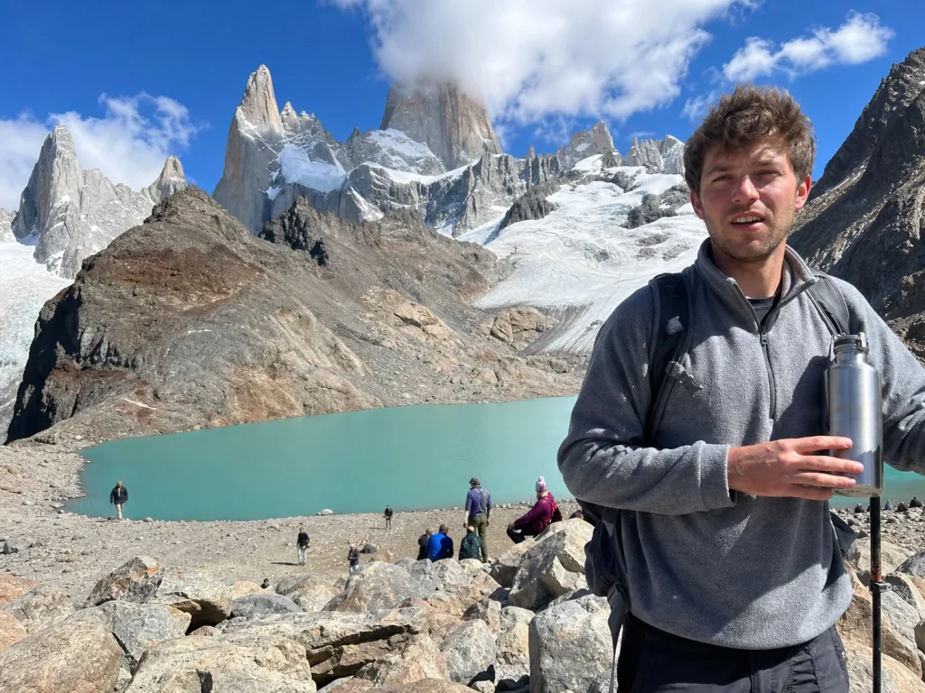 Day hiker at the Laguna de los Tres viewpoint below Fitz Roy, no technical gear