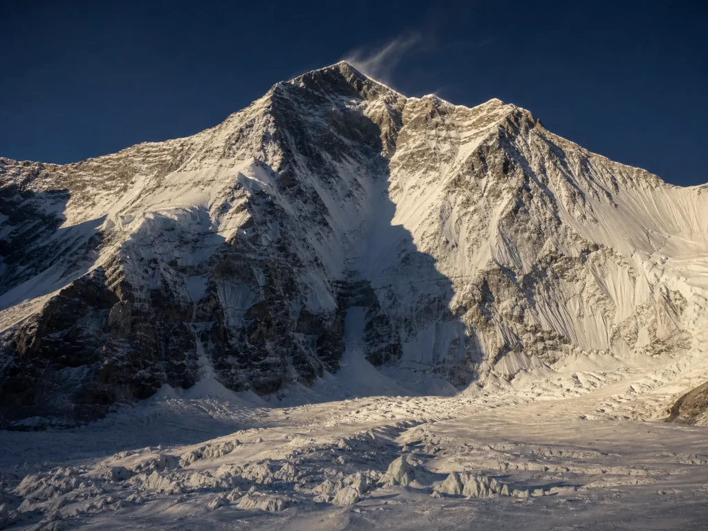 Southwest Face and summit pyramid of Mount Everest in cold evening light